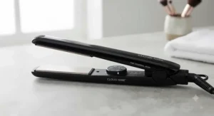 Close-up showing the variable temperature control dial on a Cloud Nine hair straightener