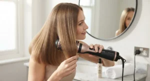 Glossy, sleek fine hair styled with an anti-frizz ionic hot air brush free from static flyaways