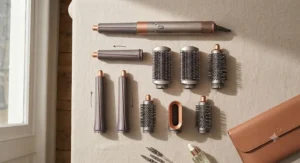 Flat lay of the best multi-styler hair tool attachments including barrels and smoothing brushes on a neutral surface